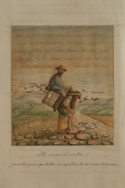 Mi escribiente pasando una quebrada a espaldas de su peón carguero